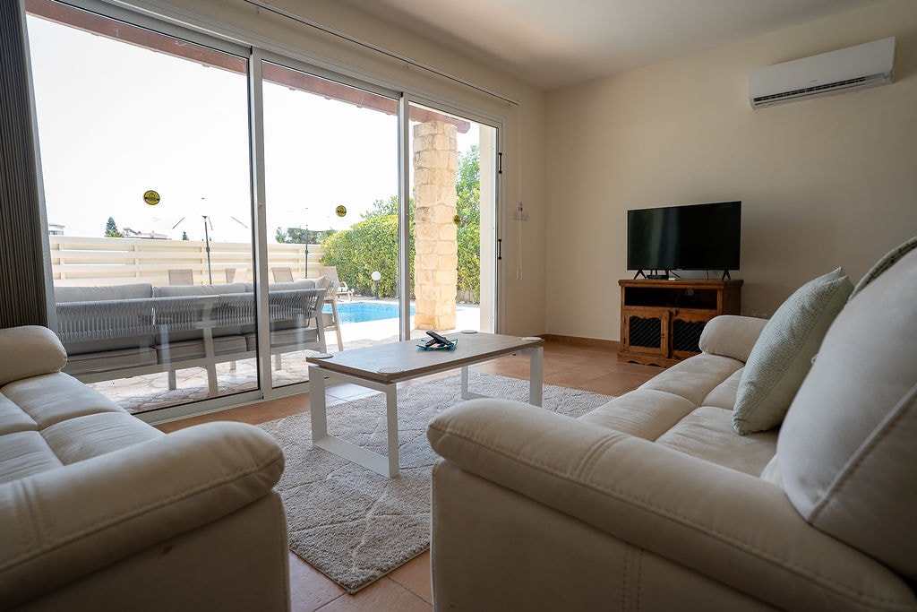 Modern living room with pool view