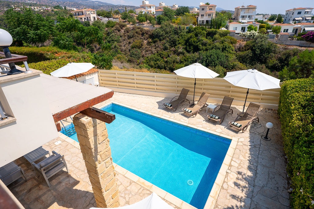 Luxury villa pool overlooking Mediterranean hills